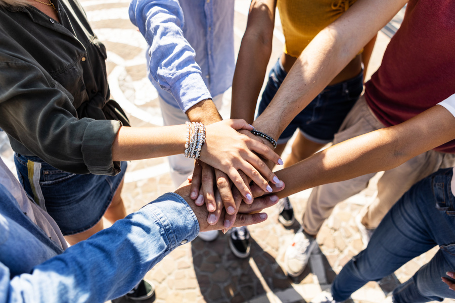 Hände zusammen als Team 